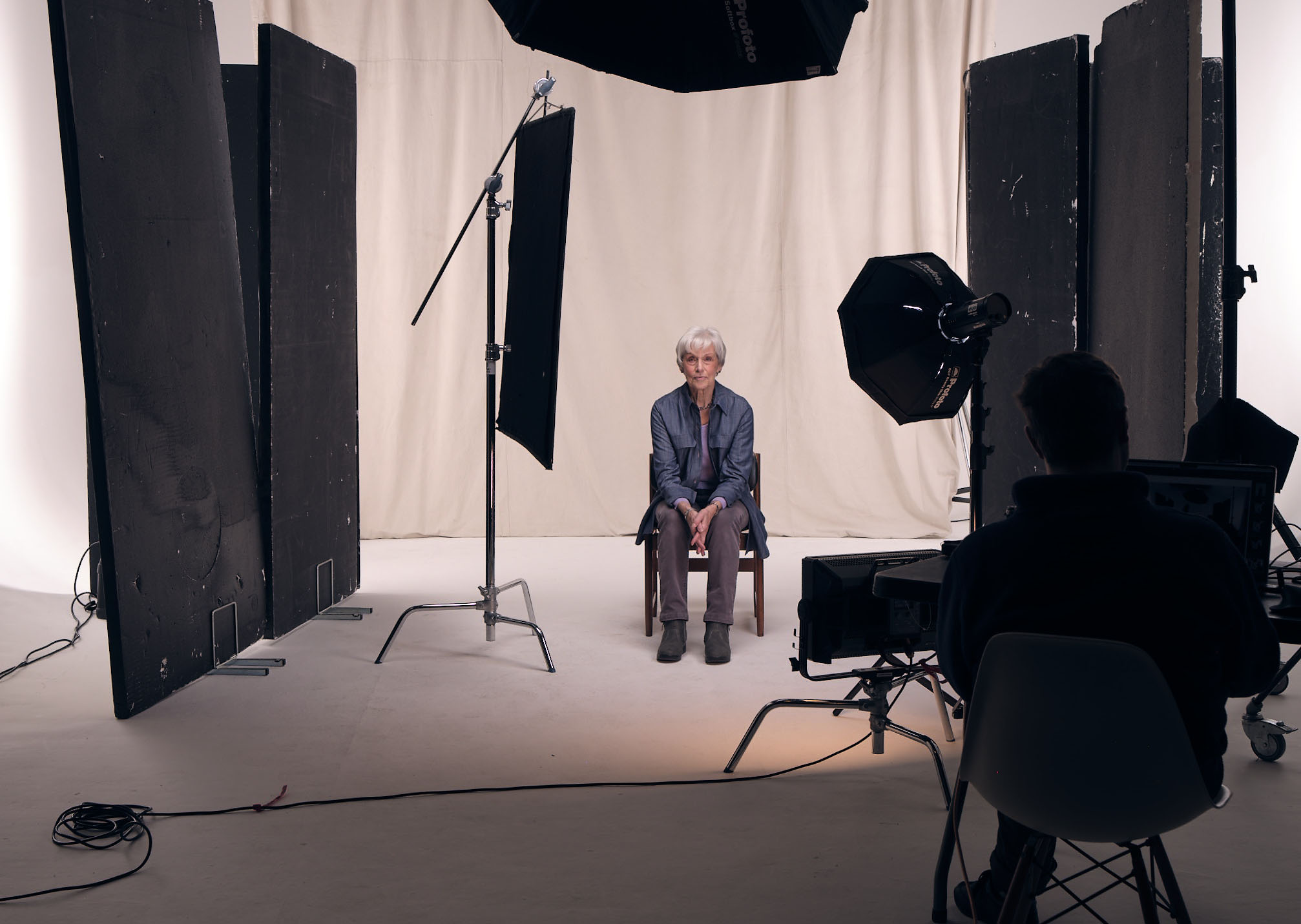 Image of Living Kidney Donor Celia sitting in a studio